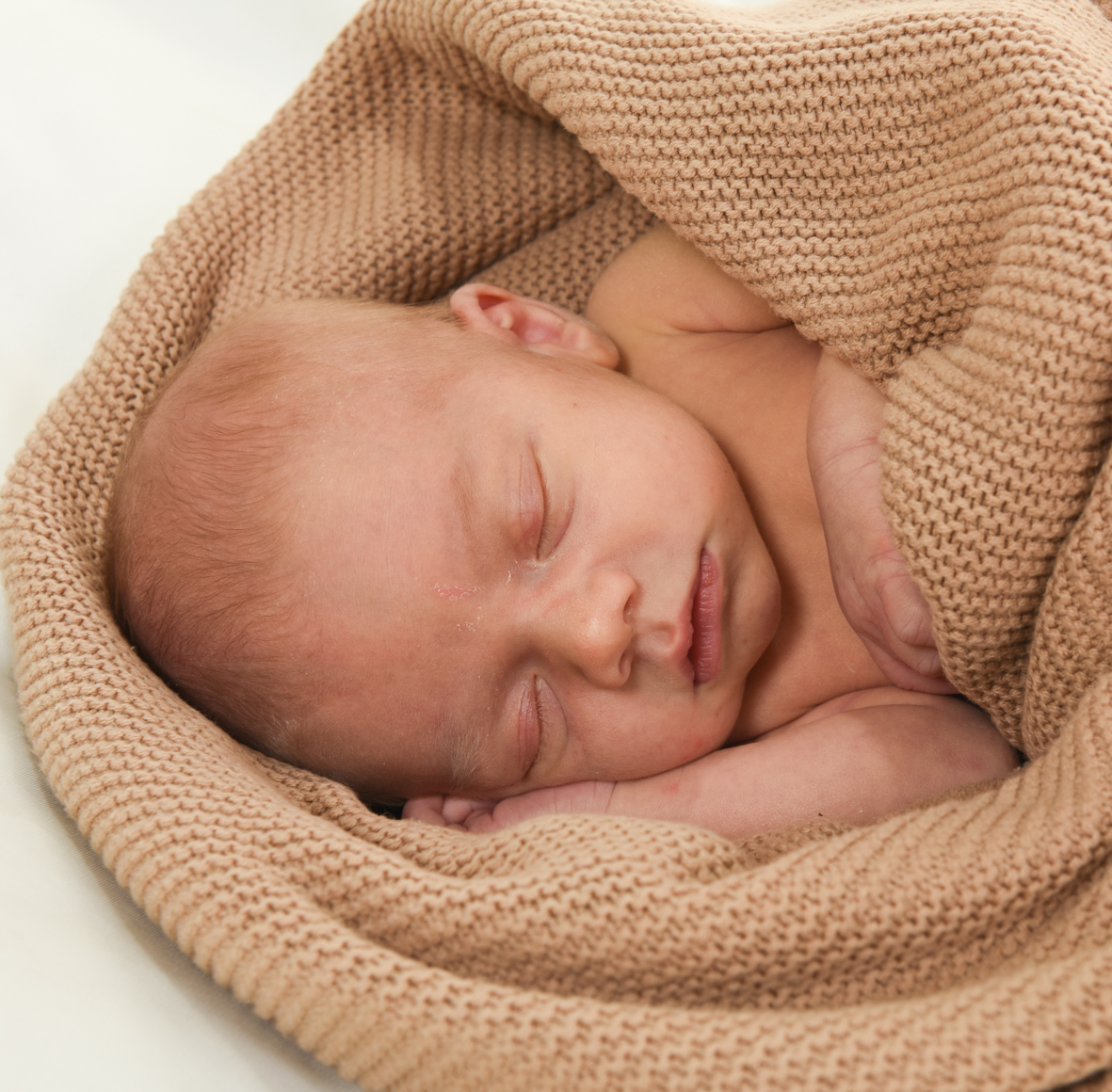 Newborn- en zwangerschapsfotografie in de studio bij Fotostudio Smitz in Eeklo